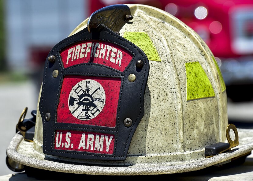 A firemen’s helmet belonging to the 5694th Engineer Detachment from the Army National Guard stationed in Mansfield, Ohio sits idle during a break in the action at an airport rescue firefighting exercise, July 18, 2017, here. The 5694th are at YARS for one week while completing their annual training. (U.S. Air Force Photo/Senior Airman Jeffrey Grossi)
