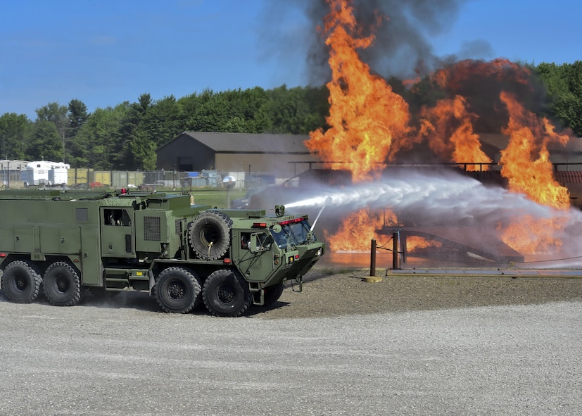 An Army M1142 Tactical Fire Fighting Truck (TFFT) from the 5694th Engineer Detachment from the Army National Guard stationed in Mansfield, Ohio, arrives to the YARS burn pit to fight back a blaze during an airport rescue firefighting exercise July 18, 2017. The TFFT is a multifunctional vehicle, ready to deploy in almost any terrain to combat five types of fires. (U.S. Air Force Photo/Senior Airman Jeffrey Grossi)
