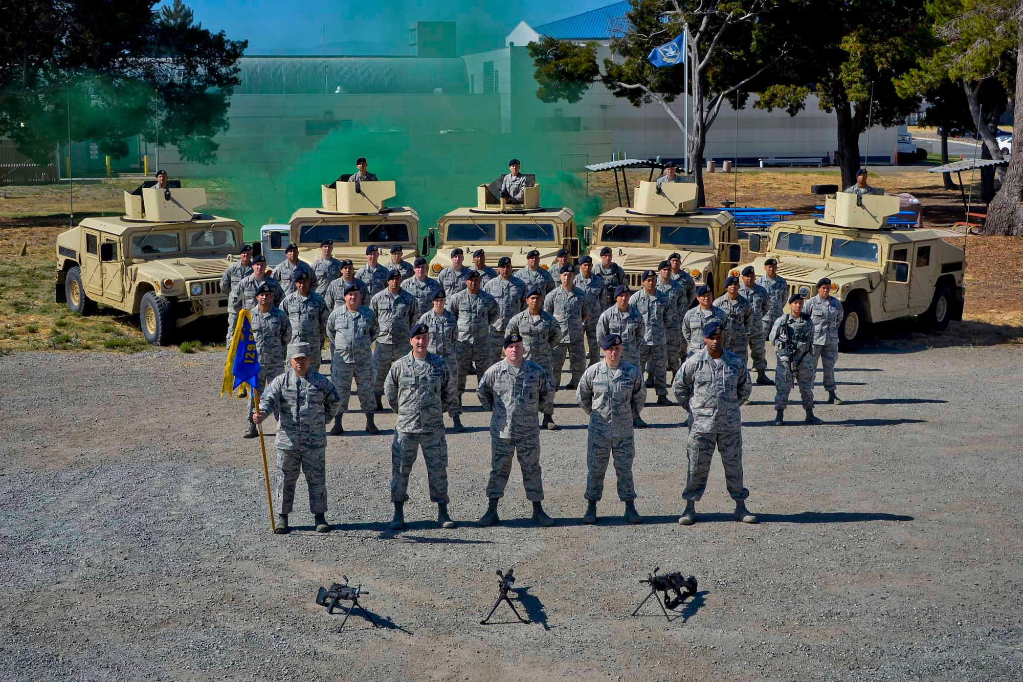 U.S. Air Force Airmen from the 129th Security Forces Squadron pose for a squadron photo at Moffett Air National Guard Base, Calif., July 18, 2017. (U.S. Air National Guard photo by Master Sgt. Ray Aquino/released)