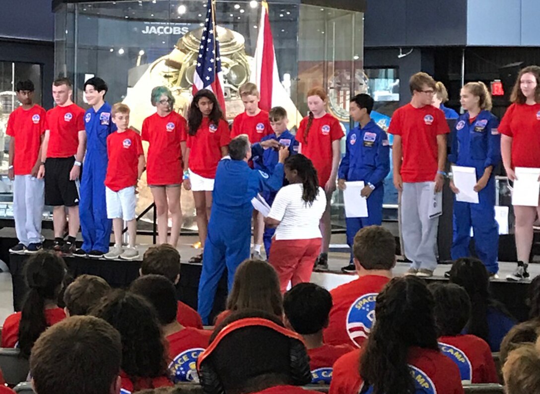 Jayce Neal graduates from Space Camp Friday at the U.S. Space & Rocket Center. A West Virginia resident, his stay in the Rocket City was made possible thanks to the Failure is Not an Option Scholarship Fund.