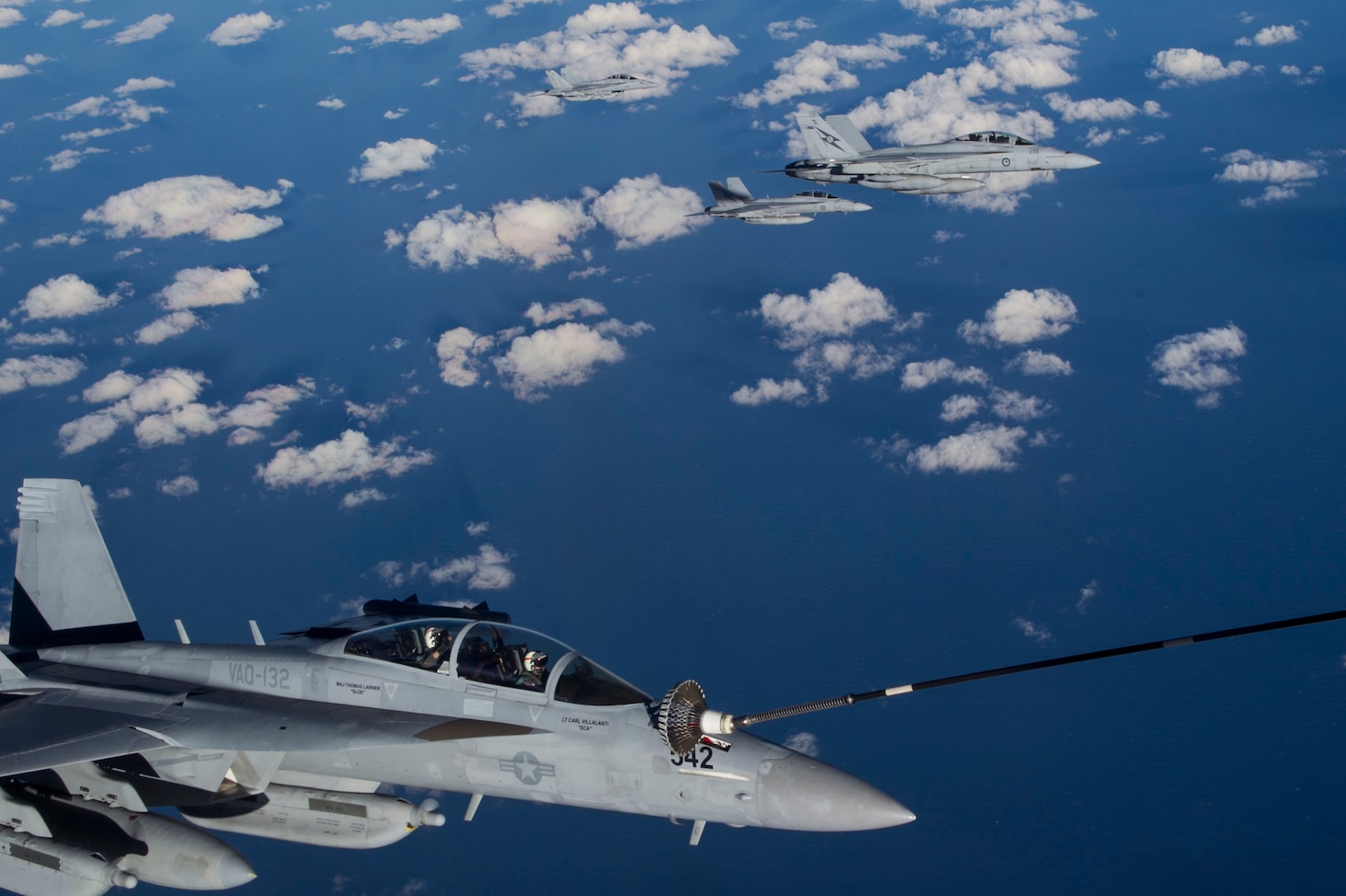United States Navy EA-18G Growlers from VAQ-132 "Scorpion" Squadron conducts Air to Air refuelling operations with an RAAF KC-30 Multi Role Tanker Transport aircraft from No 33 Squadron. Waiting for their turn are RAAF F/A-18F Super Hornets from No 1 Squadron. RAAF Base Amberley is the main operating base for RAAF and United States aircraft activities during Talisman Saber 2017.(Royal Australian Air Force photo by Sgt. Peter Borys)