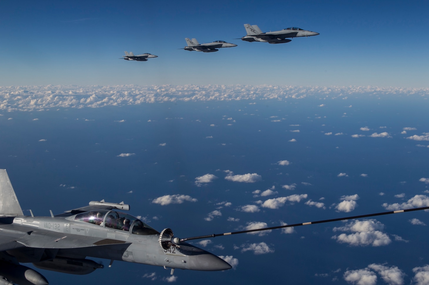 United States Navy EA-18G Growlers from VAQ-132 "Scorpion" Squadron conducts Air to Air refuelling operations with an RAAF KC-30 Multi Role Tanker Transport aircraft from No 33 Squadron. RAAF Base Amberley is the main operating base for RAAF and United States aircraft activities during Talisman Saber 2017. (Royal Australian Air Force photo by Sgt. Peter Borys)