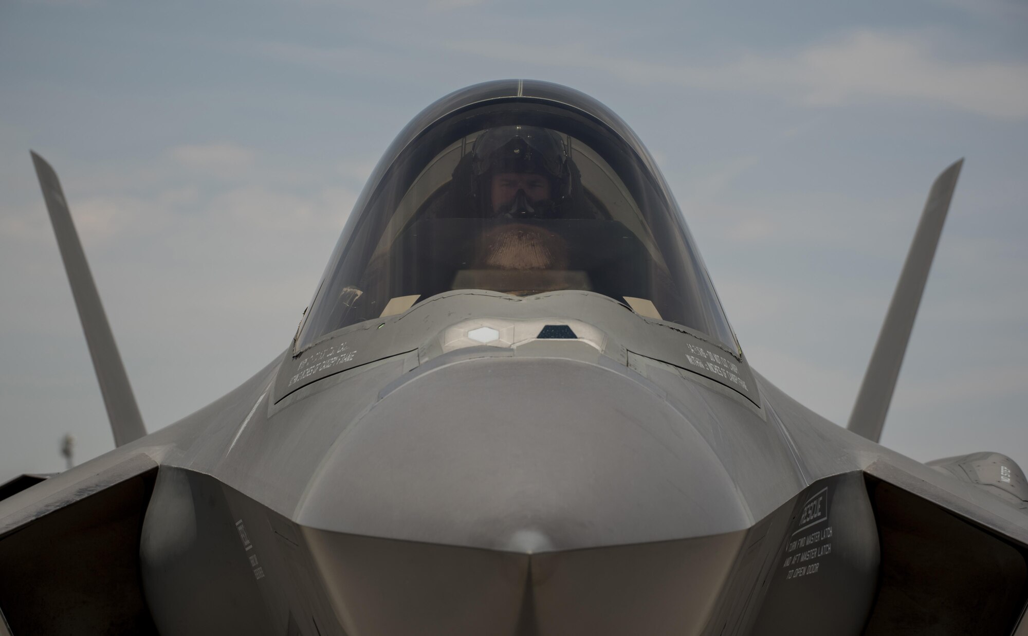 An F-35A Lightning II pilot awaits permission to taxi July 18, 2017, at Nellis Air Force Base, Nev. The 33rd Fighter Wing and Marine Attack Squadron 221 from Yuma, Ariz., participated in the first combat exercise with Air Force F-35As and Marine Corps F-35Bs operating simultaneously during Red Flag 17-3. The large scale exercise, which was developed to provide pilots with critical experience in combat situations, enabled F-35 pilots to plan and train using the same tactics, techniques and procedures. (U.S. Air Force photo by Staff Sgt. Peter Thompson)
