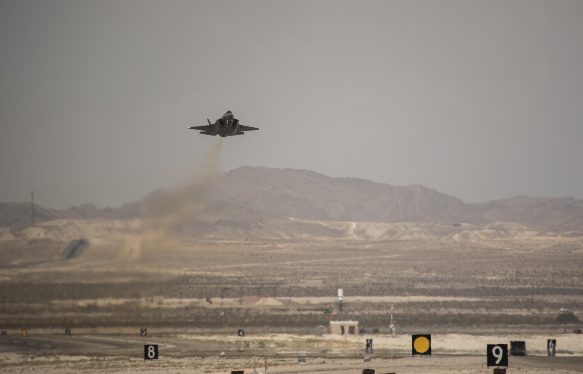 An F-35A Lightning II takes off July 18, 2017, at Nellis Air Force Base, Nev. The 33rd Fighter Wing and Marine Attack Squadron 221 from Yuma, Ariz., participated in the first combat exercise with Air Force F-35As and Marine Corps F-35Bs operating simultaneously during Red Flag 17-3. The large scale exercise, which was developed to provide pilots with critical experience in combat situations, enabled F-35 pilots to plan and train using the same tactics, techniques and procedures. (U.S. Air Force photo by Staff Sgt. Peter Thompson)