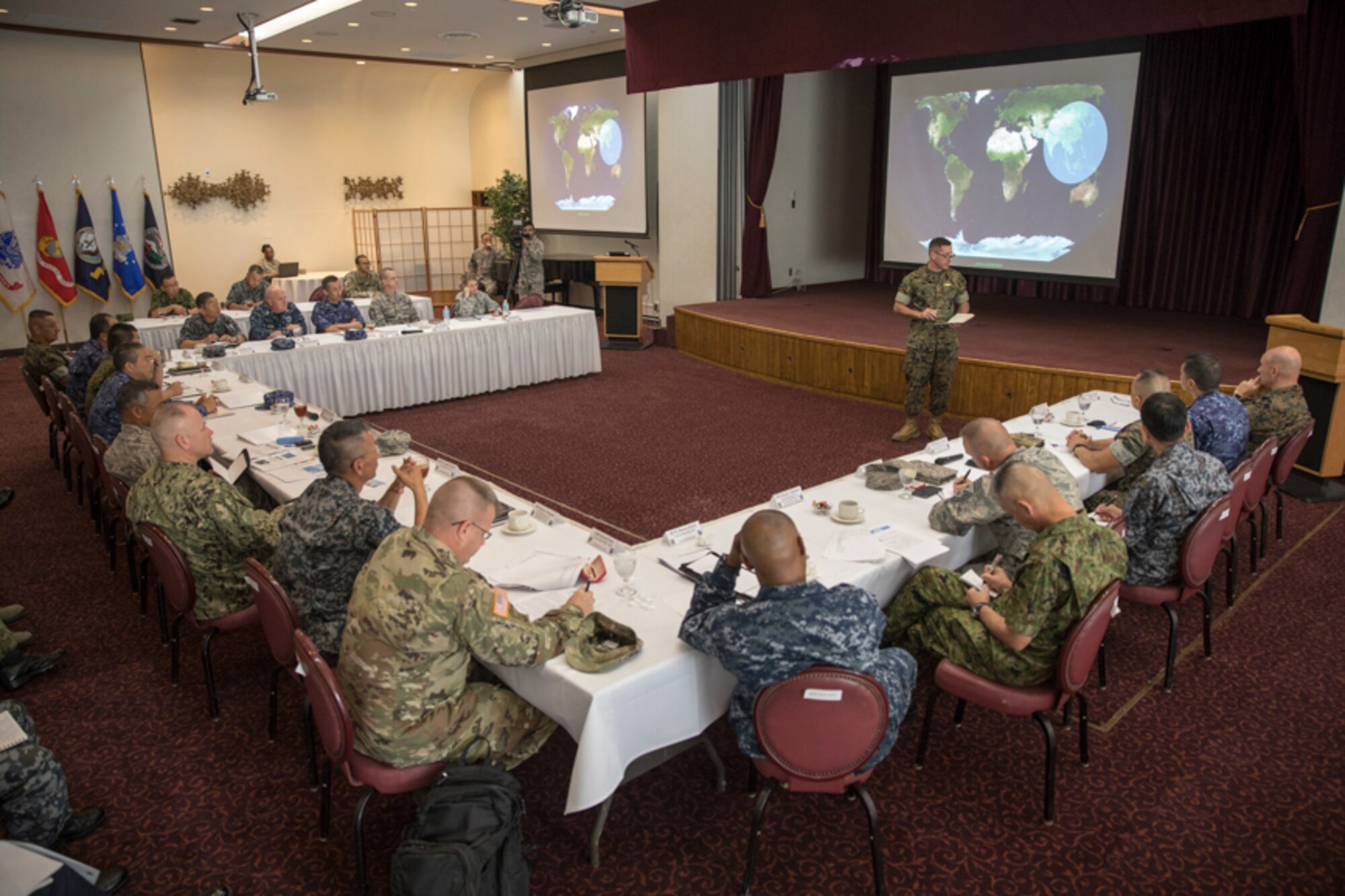 U.S. Marine Corps Sgt. Maj. Anthony Spadaro, U.S. Pacific Command senior enlisted leader, explains the PACOM area of responsibility during the bilateral Senior Enlisted Leader (SEL) Symposium at Yokota Air Base, Japan, July 13, 2017.  The symposium was a two-day event in which USFJ and JSDF component SELs discuss various enlisted leadership development programs enhancing the coordination between U.S. and Japan along with other topics of mutual concern throughout the Indo-Asia-Pacific region. (U.S. Air Force photo by Yasuo Osakabe)