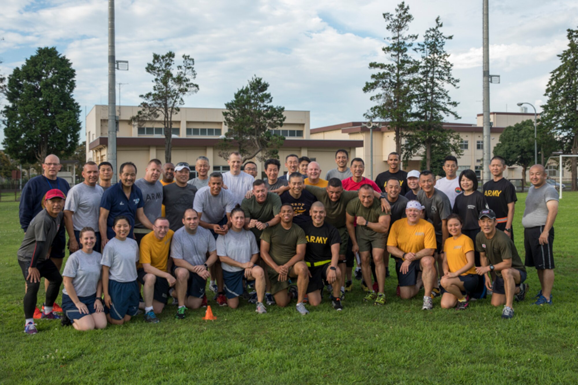U.S. and Japan Senior Enlisted leaders pose for a photo after a physical training session during the bilateral SEL Symposium at Yokota Air Base, Japan, July 14, 2017. United States Forces, Japan  component and Japan Self-Defense Forces senior enlisted leaders met to strengthen the U.S. and Japan partnership by discussing shared leadership principles including ways each service makes improvements. (U.S. Air Force photo by Yasuo Osakabe)