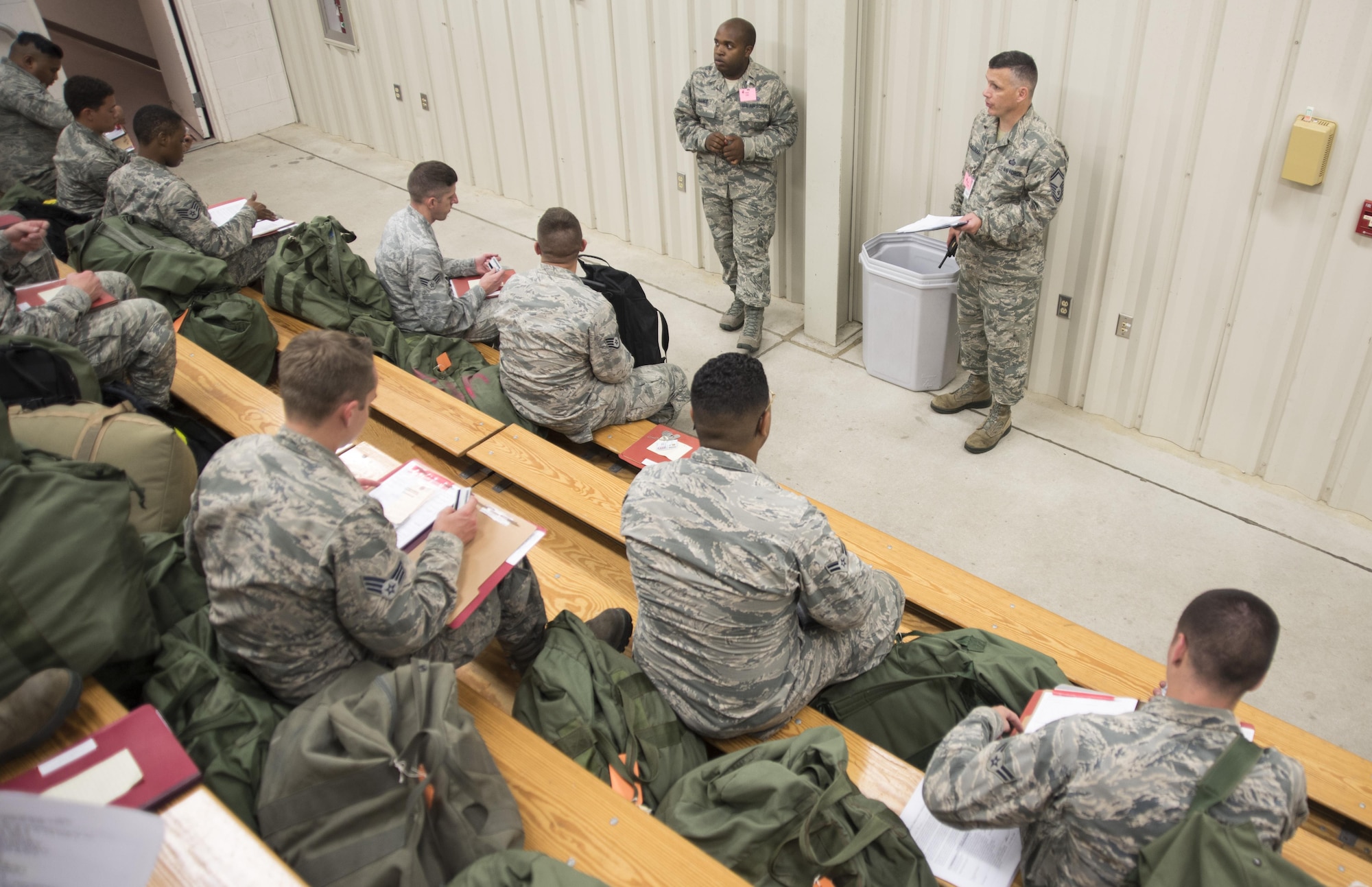 Senior Master Sgt. Virgil McCullough, 4th Force Support Squadron manpower and personnel superintendent, briefs deployers at the PDF processing center July 20, 2017, at Seymour Johnson Air Force Base, North Carolina. The pre-deployment processing was to ensure the deployers had all necessary documents and gear to prior to departing. (U.S. Air Force photo by Tech. Sgt. David W. Carbajal)
