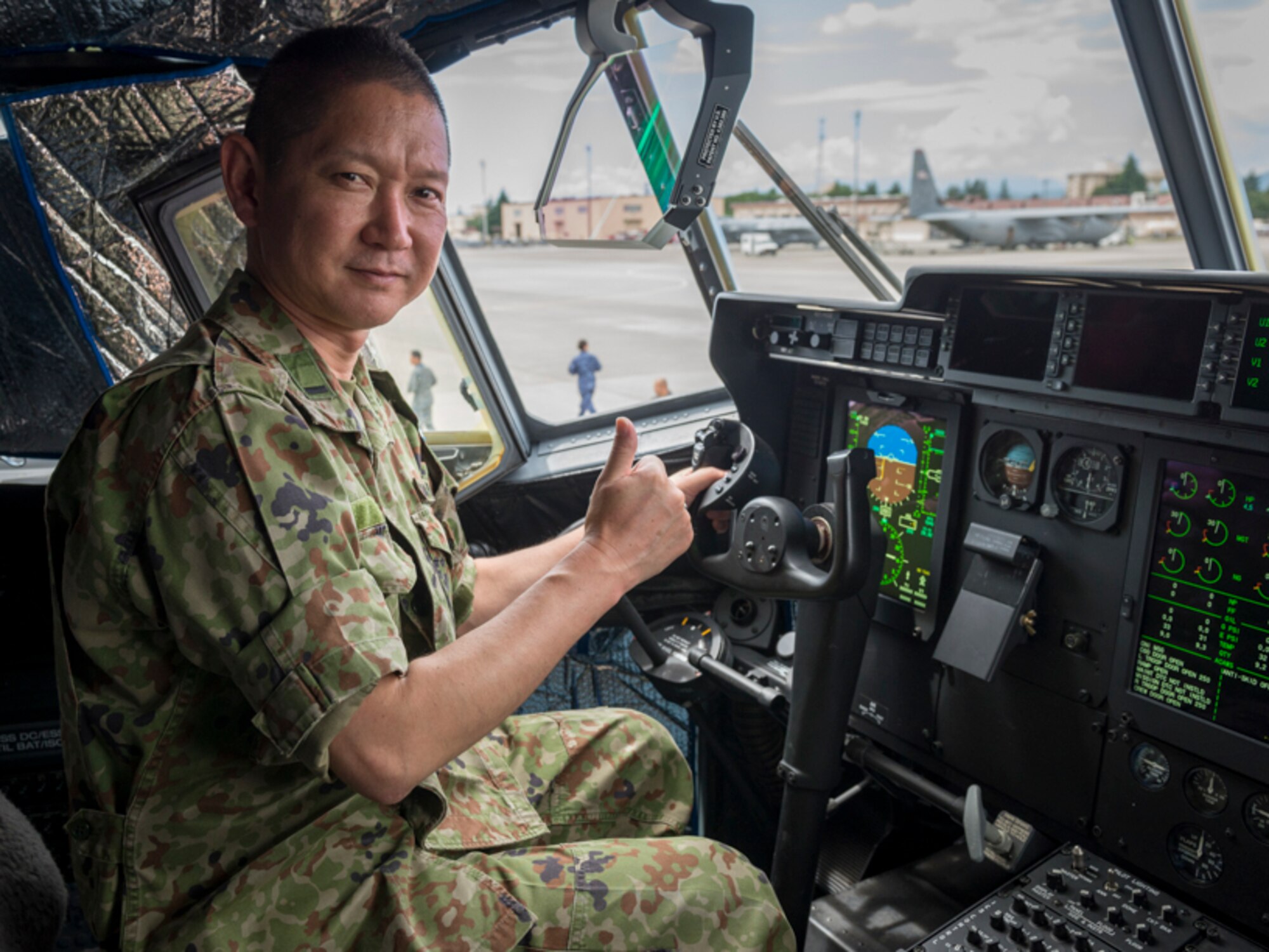 Japan Ground Self-Defense Force Warrant Officer Makoto Yahara, JGSDF Ground Staff Office liaison officer for U.S. Army Japan, poses for a photo during the bilateral Senior Enlisted Leader Symposium, July 14, 2017, at Yokota Air Base, Japan. The Symposium was a two-day event in which USFJ and JSDF component SELs discuss various enlisted leadership development programs, enhancing the coordination between U.S. and Japan, among other topics of mutual concern throughout the Indo-Asia Pacific region. (U.S. Air Force photo by Airman 1st Class Juan Torres)