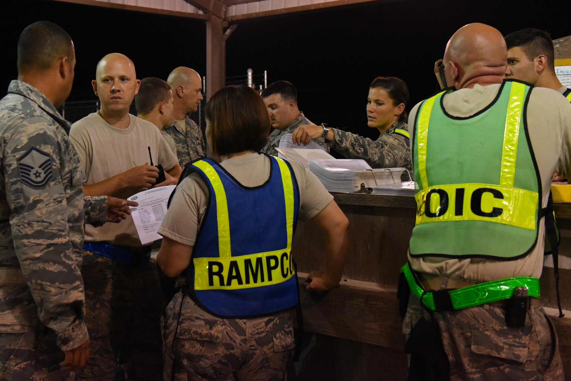 Participants of Exercise Thunderdome 17-02 review, log and analyze cargo and equipment, July 20, 2017, at Seymour Johnson Air Force Base, North Carolina. The exercise allowed members of the 4th Fighter Wing to make improvements and strengthen skills in the event of a real-world short notice deployment tasking. (U.S. Air Force photo by Senior Airman Ashley Maldonado)
