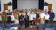 Instructors and participants pose for a group photo upon completion of the Passport Application Acceptance Training at the Professional Development Center, July 19, 2017, at Yokota Air Base, Japan. The two-day annual training is used by the Department of Defense and Department of State to certify passport agents.