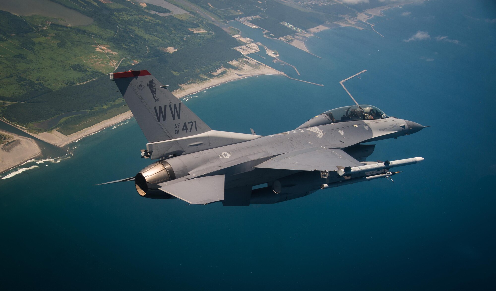 Air Force Capt. David Neville, a 13th Fighter Squadron F-16 Fighting Falcon pilot, conducts a flight sortie above northern Japan, June 12, 2017. Neville and other 13th and 14th Fighter Squadron pilots joined Kadena Air Base, Japan F-15C Eagle pilots to conduct air-to-air and suppression of enemy air defense missions during an aviation relocation training. (U.S. Air Force photo/Staff Sgt. Deana Heitzman)