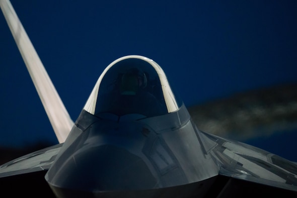 A 1st Fighter Wing F-22 Raptor taxis before take off at Joint Base Langley-Eustis, Va., July 11, 2017. The wing conducted night flying training missions to keep pilots current on skills needed to operate in the dark. (U.S. Air Force Photo/Master Sgt. Benjamin Wilson)