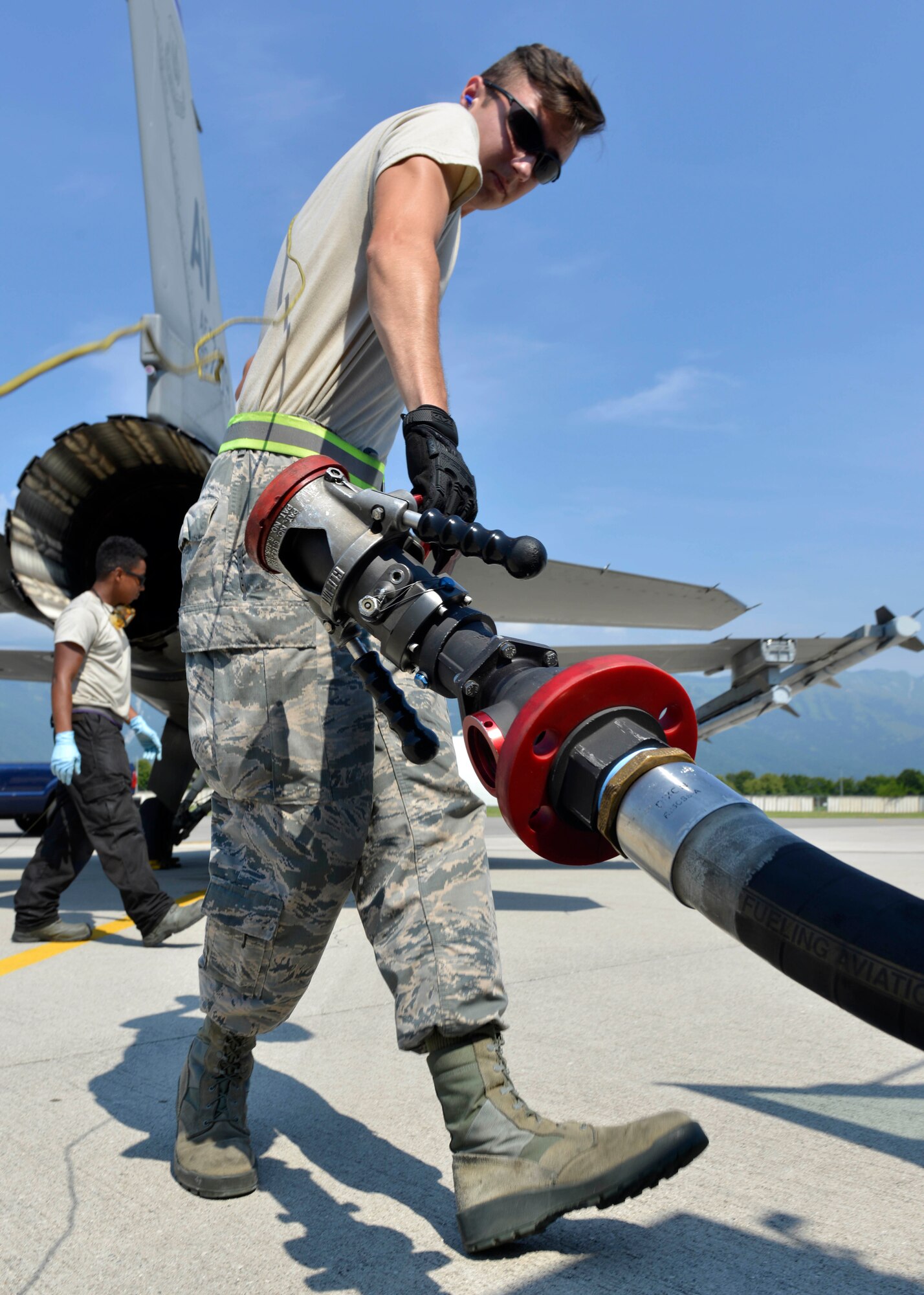 Airman 1st Class Aaron Sewell, 31st Logistics Readiness Squadron Petroleum, Oil and Lubricants distribution operator, prepares to refuel an F-16 Fighting Falcon, July 19, 2017, at Aviano Air Base, Italy. Air Force reservists assigned to the 512th LRS, Dover Air Force Base, Delaware, joined the 31st LRS for two weeks of training. (U.S. Air Force photo by Senior Airman Cary Smith)