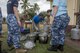 U.S. Air Force Tech. Sgt. Michelle Zenawick, a certified dental technician with the 36th Medical Group at Andersen Air Force Base, Guam, shows U.S. and Australian service members how to properly sterilize dental tools and equipment using pressure cookers during Pacific Angel 17-3 at Tagitagi Sangam School and Kindergarten in Tavua, Fiji, July 15, 2017. With limited facilities and no other way to sterilize their equipment, Zenawick and her team improvised, ensuring the humanitarian medical service could continue without a hitch. (U.S. Air Force photo/Tech. Sgt. Benjamin W. Stratton)