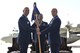 Col. Michael Manion (left), 55th Wing commander, passes the 55th Electronic Combat Group guidon to Col. Phil Acquaro who assumed command of the unit July 10, 2017 at Davis-Monthan Air Force Base, Arizona. (U.S. Air Force photo)