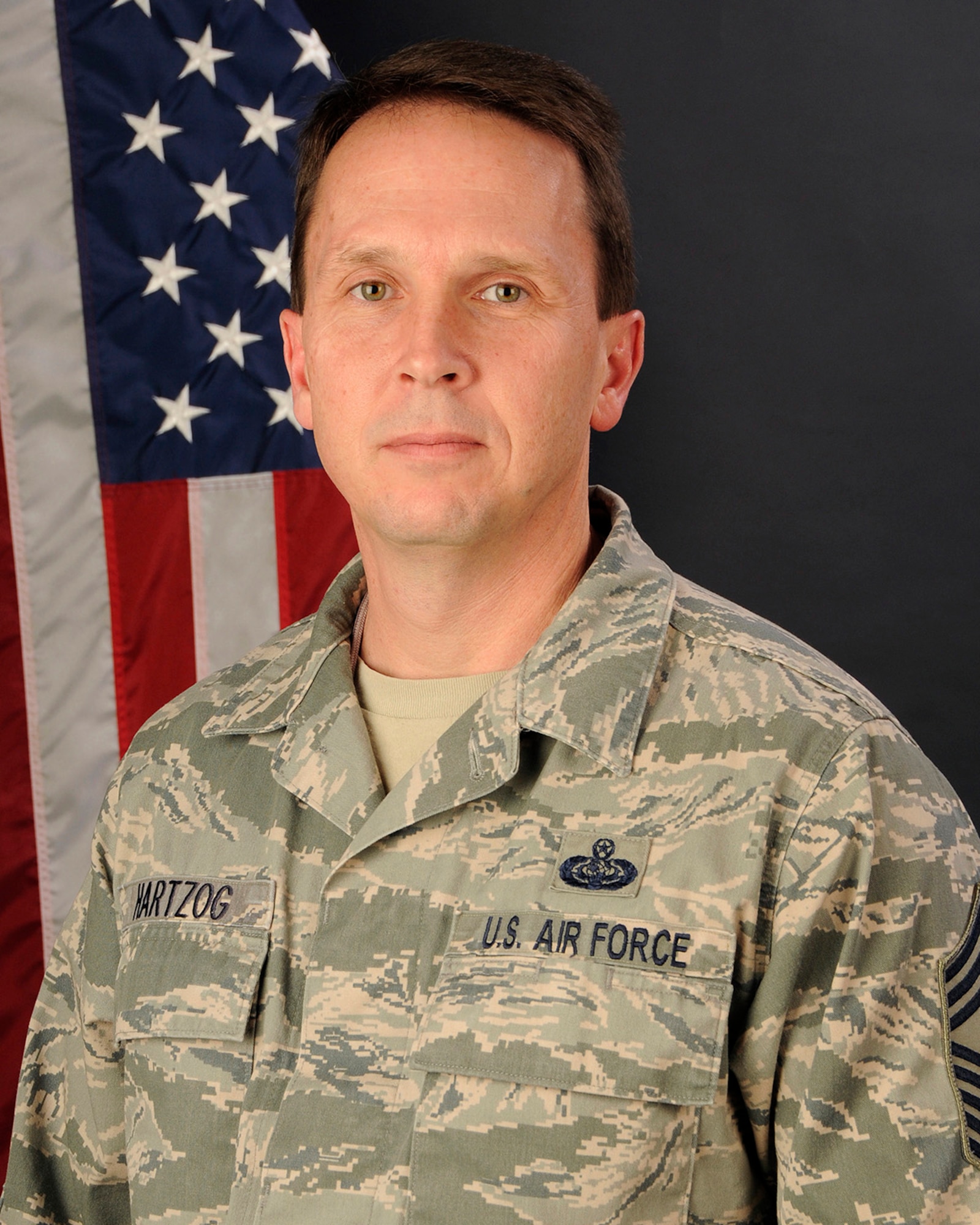 U.S. Air Force Chief Master Sgt. Robert Hartzog, with the 169th Communications Flight at McEntire Joint National Guard Base, S.C., poses for a photo on Jan. 9, 2013.
(U.S. Air National Guard photo by Tech. Sgt. Caycee Watson/Released)