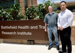 Michael Wetzel, Ph.D. (left) and Tony Chao, Ph.D. (right) are the two Shock Society-Department of Defense Battlefield Health and Trauma Fellowship in San Antonio post-doctoral fellows at the U.S. Army Institute of Surgical Research at Joint Base San Antonio-Fort Sam Houston.