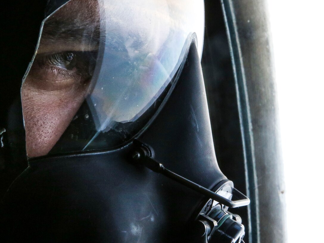 A Marine assigned to Marine Aerial Refueler Transport Squadron 252 participates in a Chemical, Biological, Radiological, and Nuclear training exercise at Marine Corps Air Station Cherry Point, July 13, 2017. The training expanded upon the Marines knowledge of how to properly react and contain a CBRN attack aboard a KC-130J Super Hercules. VMGR-252 is assigned to Marine Aircraft Group 14, 2nd Marine Aircraft Wing. (U.S. Marine Corps photo by Cpl. Jason Jimenez/ Released)