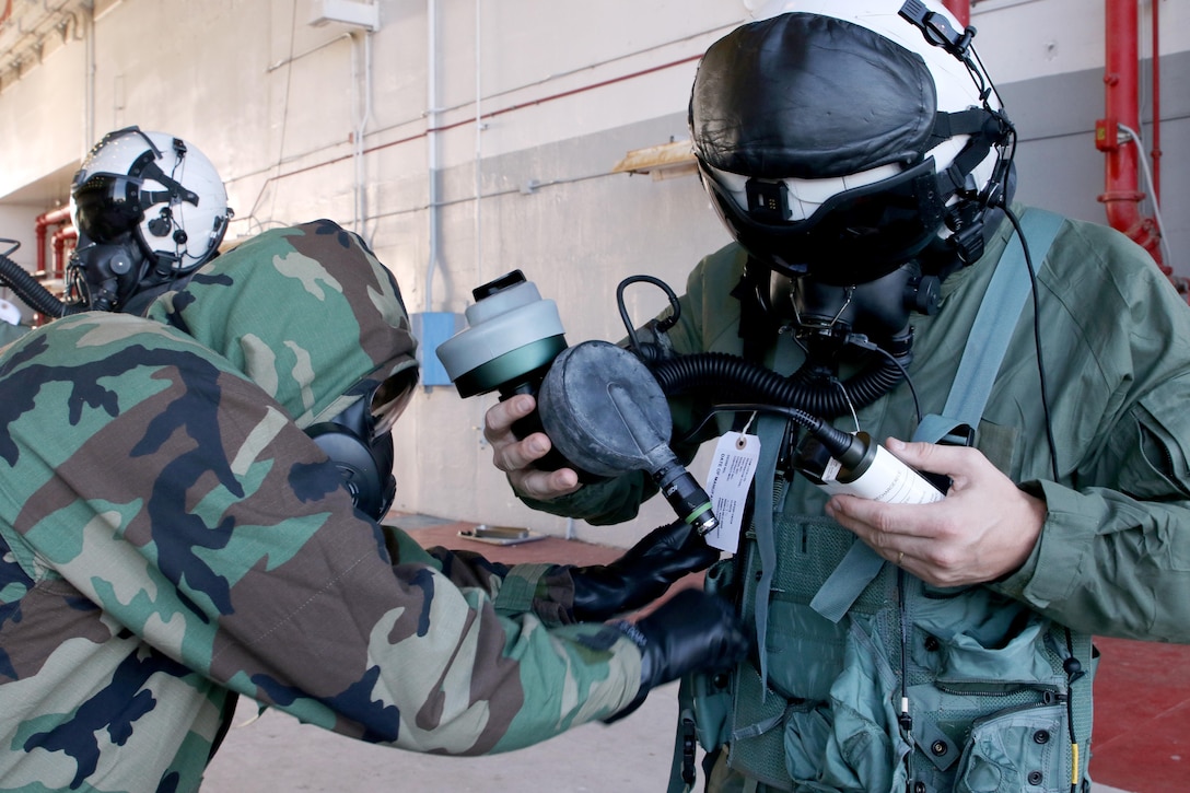 Marines assigned to Marine Aerial Refueler Transport Squadron 252 participate in a Chemical, Biological, Radiological, and Nuclear training exercise at Marine Corps Air Station Cherry Point, July 13, 2017. The training expanded upon the Marines knowledge of how to properly react and contain a CBRN attack aboard a KC-130J Super Hercules. VMGR-252 is assigned to Marine Aircraft Group 14, 2nd Marine Aircraft Wing. (U.S. Marine Corps photo by Cpl. Jason Jimenez/ Released)