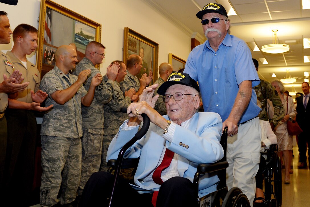 Navy veteran Donald Stratton salutes fellow service members honoring him and other survivors of the battleship USS Arizona during an event at the Pentagon, July 21, 2017. Stratton is one of five known living survivors of the Arizona which was sunk during the Japanese attack on Pearl Harbor, Dec. 7, 1941.