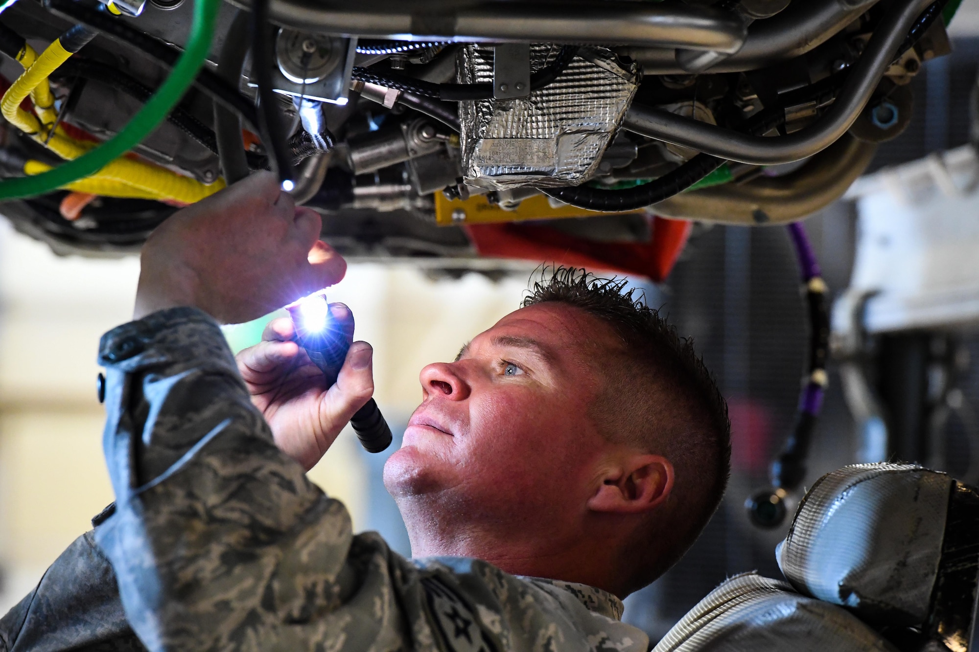 Staff Sgt. Cody Bain, 419th Maintenance Squadron Propulsion Flight, performs final inspections on an F110-GE-100 jet engine, Hill Air Force Base, Utah, July 13, 2017. The unit produces 30-50 overhauled engines per year for Hill, Holloman and Nellis Air Force Bases. (U.S. Air Force photo/R. Nial Bradshaw)