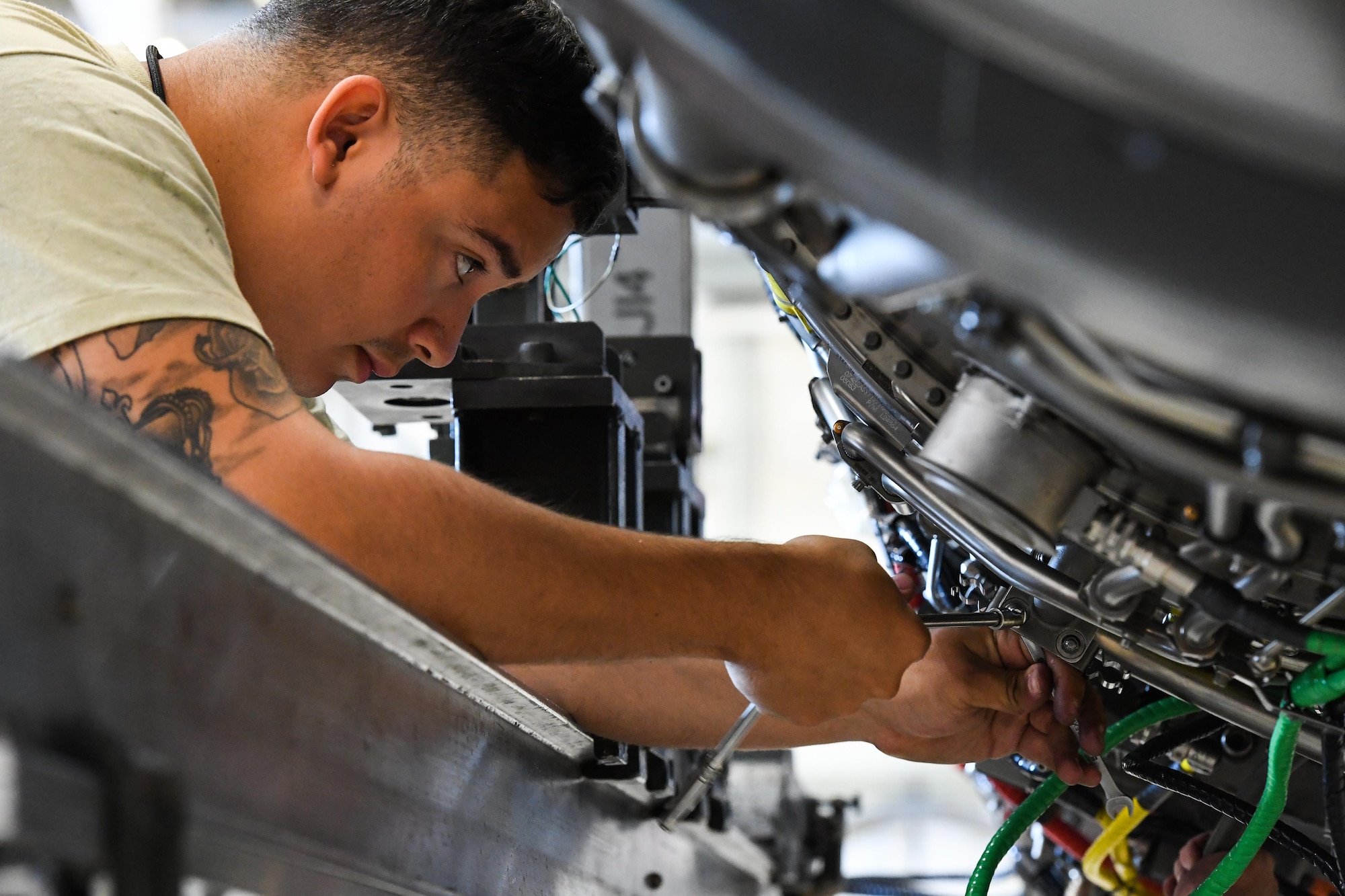 Senior Airman Elias Oquendo, 388th Maintenance Squadron Propulsion Flight, performs final maintenance and inspections on an F-16 jet engine, Hill Air Force Base, Utah, July 13, 2017. (U.S. Air Force photo/R. Nial Bradshaw)