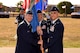 U.S. Air Force Maj. Gen. Robert LaBrutta, 2nd Air Force Commander, passes the guideon to Col. Ricky Mills, 17th Training Wing Commander, at the parade field on Goodfellow Air Force Base, Texas, July 21, 2017. The change of command ceremony is a time honored military tradition that signifies the orderly transfer of authority. (U.S. Air Force photo by Airman 1st Class Randall Moose/Released)