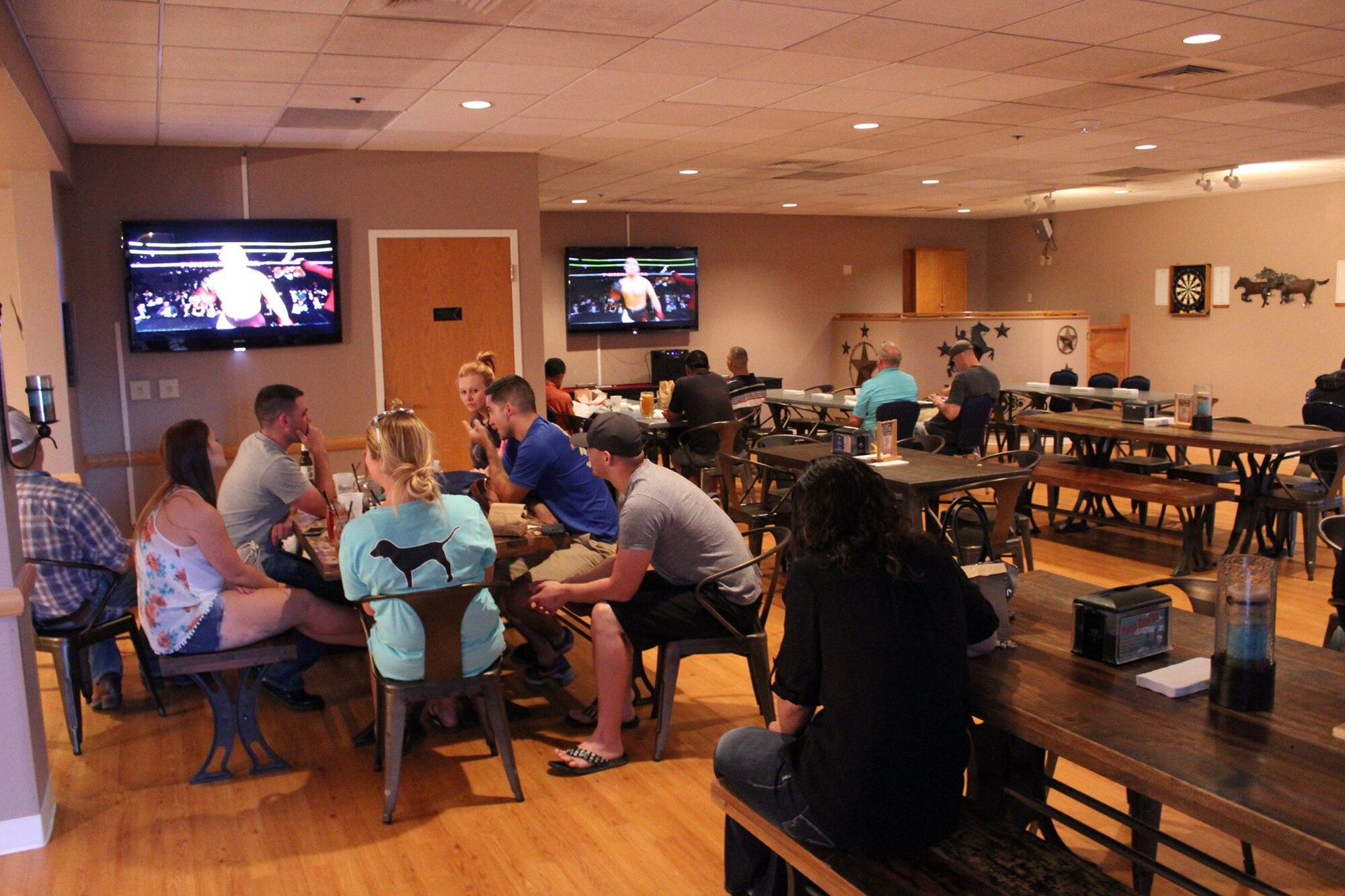 Members of the Mighty Ninety attend an Ultimate Fighting Championship event hosted by the Trail’s End Event Center at F.E. Warren Air Force Base, Wyo., July 9, 2016. The Air Force Club hosts multiple events year-round for club members and the community. (U.S. Air Force courtesy photo) 