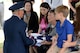 Chief Master Sgt. Kevin Terrell, retired, presents the American Flag to Madeline Emrick, family member of Airman 1st Class Phillip Emrick, during his funeral July 14. Final Salute, a pilot course recently held on a voluntary basis for members of the Tinker Honor Guard, emphasizes professional development through the importance of honoring those who have served at military funerals and based upon the book, “The Final Salute.”