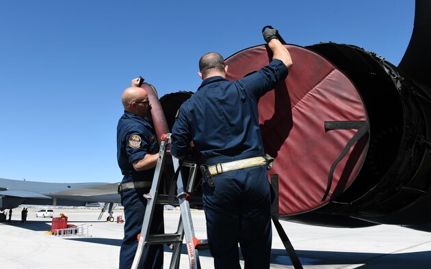U.S. Air Force Tech. Sgt. Christopher Dial, left, and Staff Sgt. Christopher Graham, 337th Test and Evaluation Squadron B-1 avionics technicians, at Nellis Air Force Base, Nev., June 14, 2017. The 337th TES spent time at Nelllis AFB conducting operational testing on Sustainment Block 17 with students and instructors at the U.S. Air Force Weapons School. 