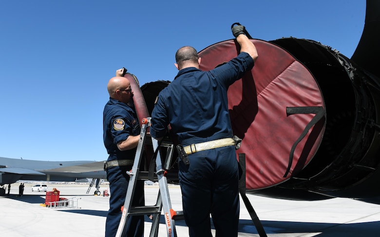 U.S. Air Force Tech. Sgt. Christopher Dial, left, and Staff Sgt. Christopher Graham, 337th Test and Evaluation Squadron B-1 avionics technicians, at Nellis Air Force Base, Nev., June 14, 2017. The 337th TES spent time at Nelllis AFB conducting operational testing on Sustainment Block 17 with students and instructors at the U.S. Air Force Weapons School. 