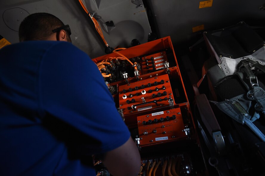 Danel Mendoza, 337th Test and Evaluation Squadron instrumentation specialist, installs a Consolidated Data Acquisition System drive in a B-1B Lancer at Nellis Air Force Base, Nev., June 14, 2017. The CDAS collects data from all aspects of the jet to help test the new software for Sustainment Block 17. 