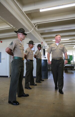 Educators with the Educator’s Workshop take part in a mock pick up at Marine Corps Recruit Depot San Diego, July 11. The workshop is a program hosted by MCRD San Diego that gives educators an inside look at the process of recruit training and the different benefits the Marine Corps has to offer.
