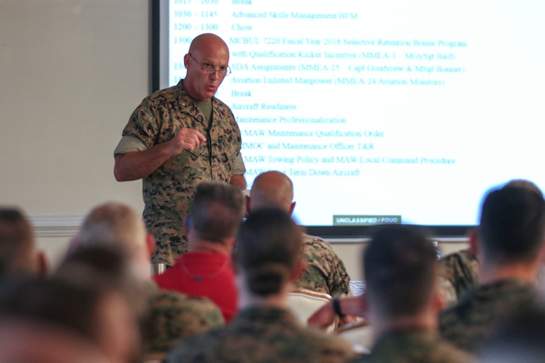 Col. Scott Hallstrom speaks to Marines during a maintenance symposium held at Marine Corps Air Station New River, N.C., July 18, 2017. The symposium provided an opportunity for commanders and maintenance personnel to discuss ideas on how to reduce mishaps on flight lines and increase readiness. Hallstrom is a logistician assigned to Marine Wing Headquarters Squadron 2, 2nd Marine Aircraft Wing. (U.S. Marine Corps photo by Cpl. Cody Lemons/released)