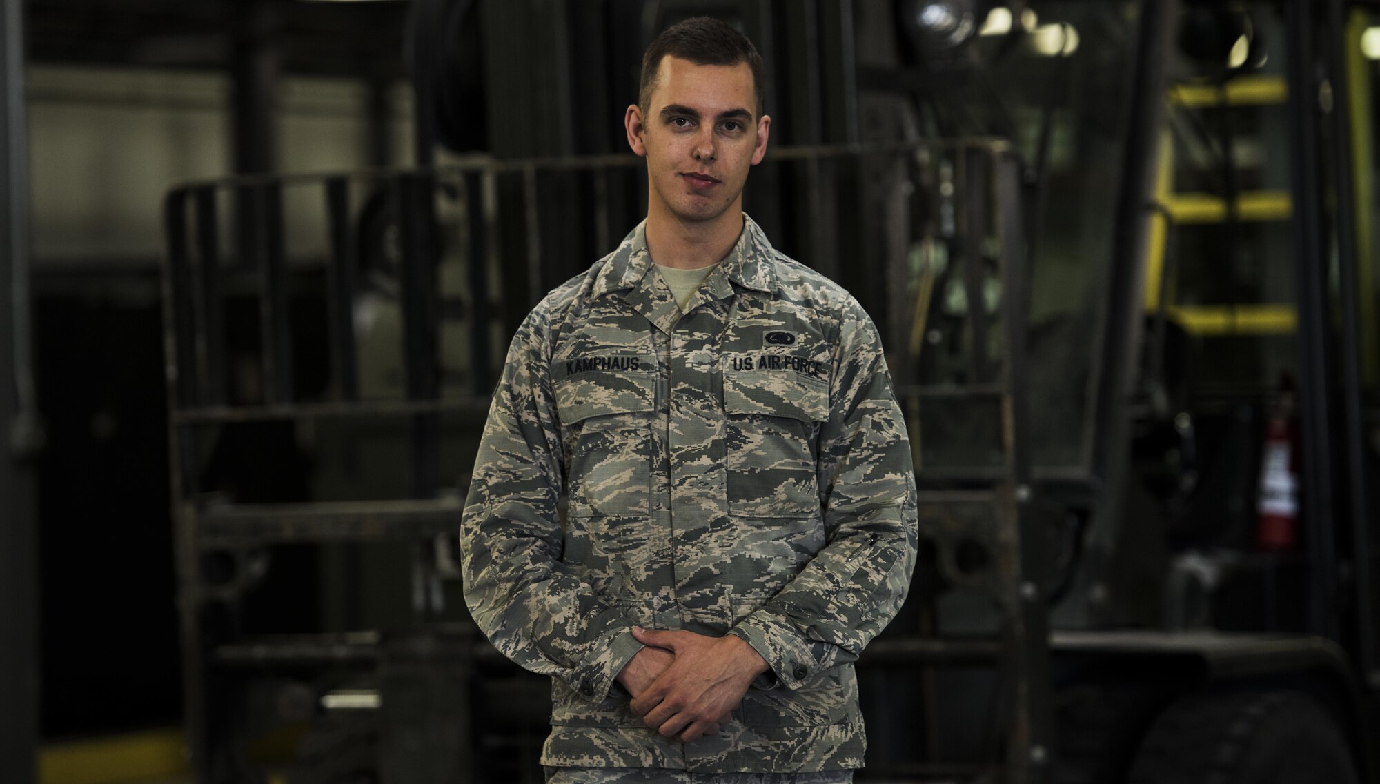 Senior Airman Brian Kamphaus, a 92nd Logistics Readiness Squadron material management journeyman, joined the military following in the footsteps of his father and grandfather and has been serving in the Air Force for more than three years, making the most of every possible minute. (U.S. Air Force photo/Senior Airman Sean Campbell)