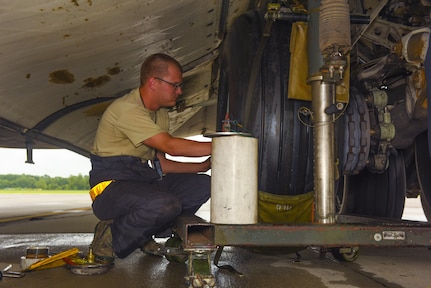 Staff Sgt. Stephen Gasperic, 437th Aircraft Maintenance Squadron crew chief, performs a tire change on a C-17 Globemaster III on the flightline at Joint Base Charleston, S.C. July 17, 2017. The C-17’s airlift capabilities are used to deploy U.S. armed forces anywhere in the world within hours. Additionally the C-17’s help sustain troops in  conflict, humanitarian, airlift and airdrop efforts.