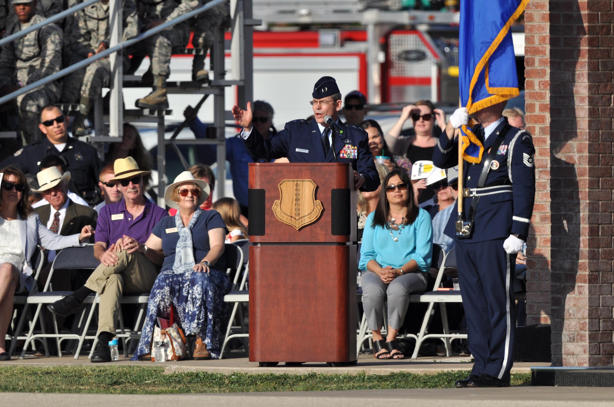 U.S. Air Force Maj. Gen. Robert LaBrutta, 2nd Air Force Commander, thanks the 17th Training Wing for their support during the tenure of Col. Michael Downs, 17th TRW Commander, at the change of command ceremony on the parade field at Goodfellow Air Force Base, Texas July 21, 2017. The change of command ceremony is a time honored tradition for the orderly transfer of authority from the departing commander to the new commanding officer. The 17th Training Wing's mission is to develop and inspire exceptional intelligence, surveillance and reconnaissance, and fire protection professionals for America and her allies. (U.S. Air Force photo by Russell Stewart/Released)