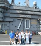 Educators from South Texas on the flight deck of the nuclear-powered aircraft carrier USS Carl Vinson (CVN 70) during Navy Recruiting District San Antonio’s annual Educators Orientation Visit, or EOV.  The EOV is a Navy Recruiting Command program with a main focus of showing educators the various facets of the Navy and the many career paths available to students. The group visited Naval Base San Diego, Helicopter Maritime Strike Squadron THREE FIVE (HSM-35), BUD/S (Basic Underwater Demolition/SEAL) Training at Naval Amphibious Base Coronado, the Pacific Beacon Navy Billeting, the Fleet Readiness Center, Coastal Riverine Group ONE, and the Navy Exchange.