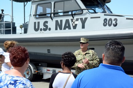 Chief Petty Officer William Sage, senior enlisted leader, Coastal Riverine Squadron THREE, Coastal Riverine Group ONE, briefs educators from South Texas on the capabilities and missions of the tactical patrol craft during Navy Recruiting District San Antonio’s annual Educators Orientation Visit (EOV). The EOV is a Navy Recruiting Command program with a main focus of showing educators the various facets of the Navy and the many career paths available to students.