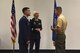 U.S. Marine Corps Maj. Andrew Armstrong, Goodfellow Marine Corps Detachment Commanding Officer, speaks with U.S. Air Force Col. Ricky Mills, 17th Training Wing Commander, at the Event Center on Goodfellow Air Force Base, Texas, July 21, 2017. The Event Center hosted a reception inviting Goodfellow members could welcome the new commander. (U.S. Air Force photo by Airman 1st Class Chase Sousa/Released)