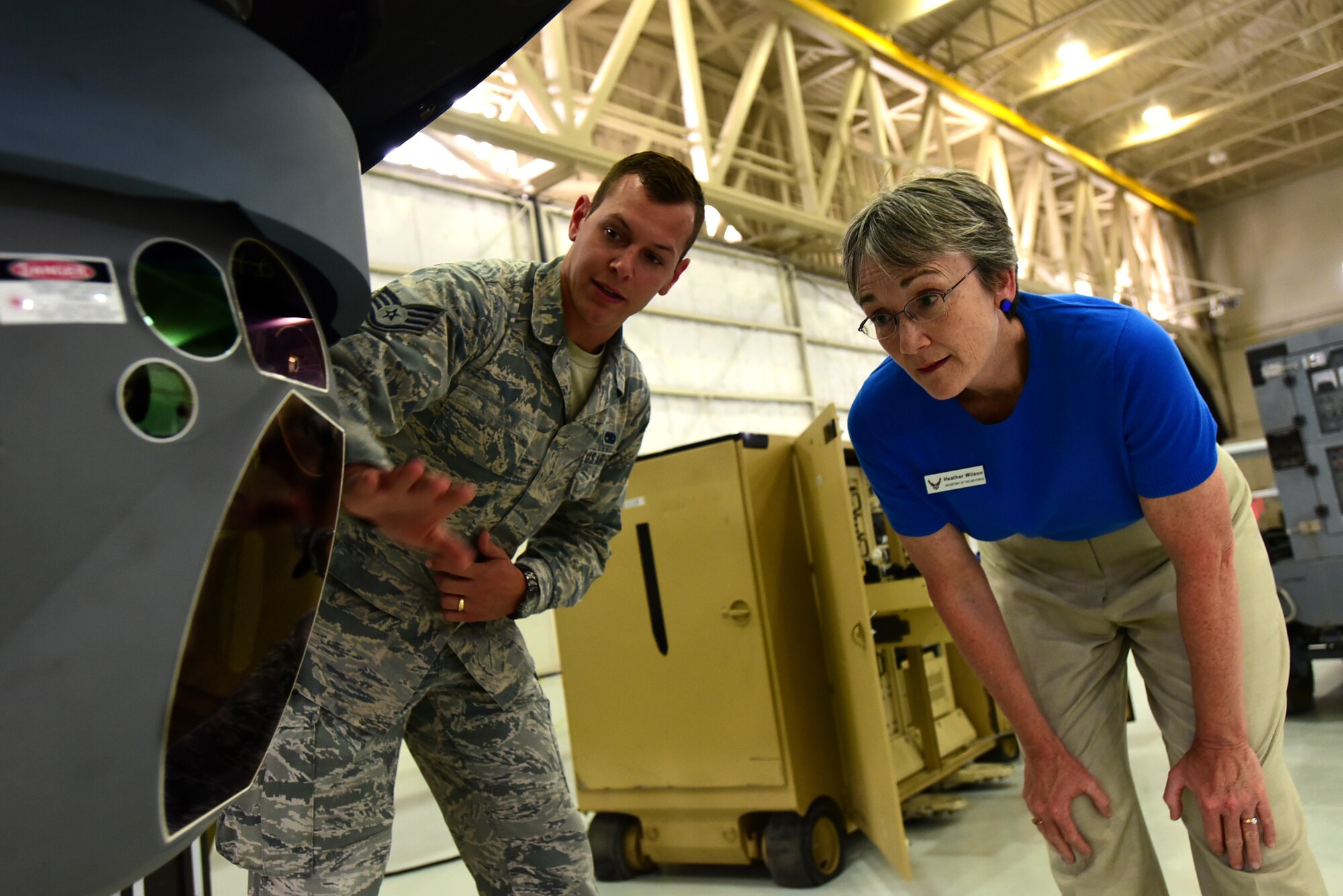 Secretary of the Air Force Heather Wilson is briefed on the Multi-Spectral Targeting system by Staff Sgt. Evan, 432nd Aircraft Maintenance Squadron avionics craftsman July 19, 2017, at Creech Air Force Base, Nev. During her visit, Wilson was briefed on the specifics on the current MQ-1 Predator and MQ-9 Reaper fleet as the missions they enable for the joint force commanders. (U.S. Air Force photo/Senior Airman Christian Clausen)