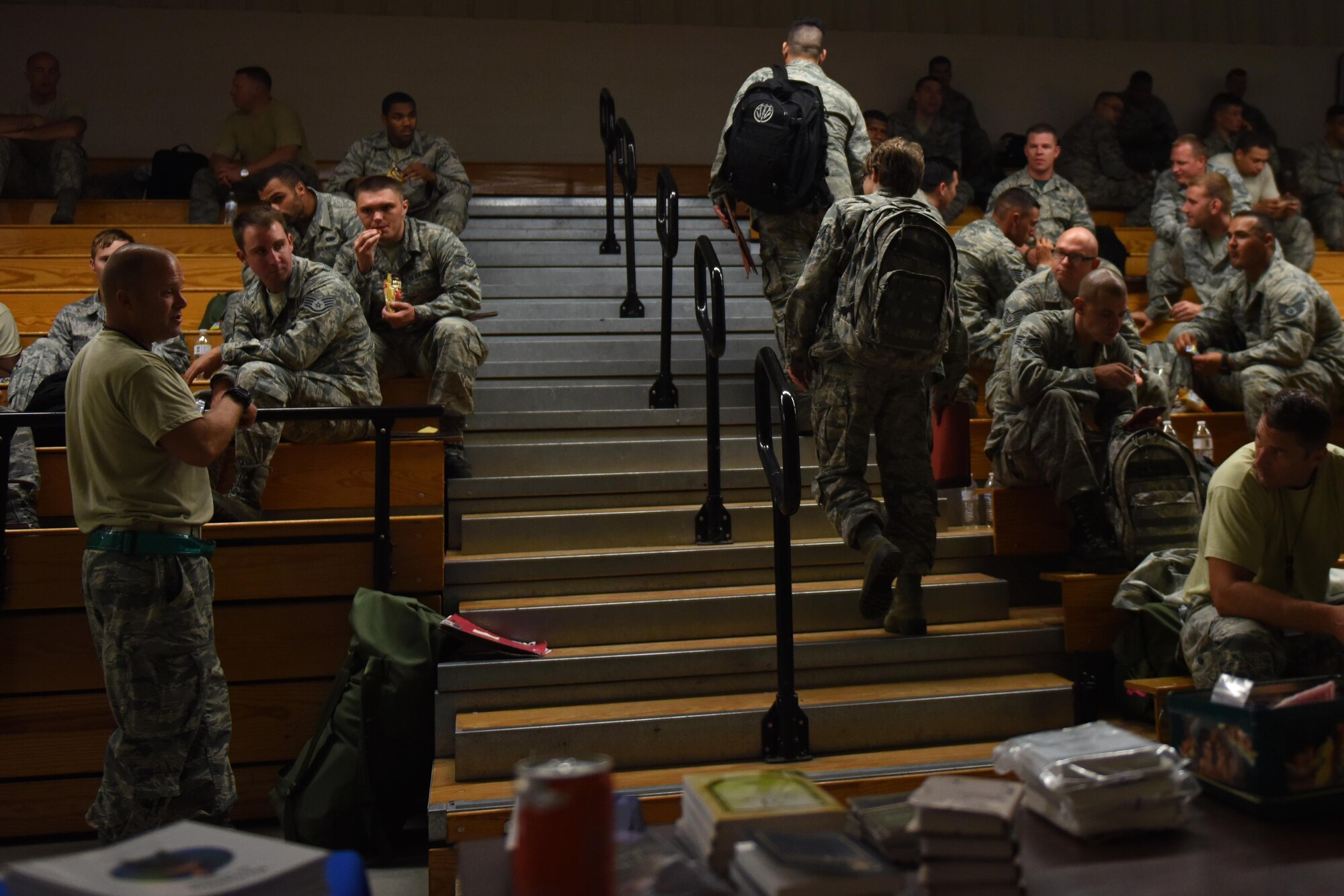 Exercise Thunderdome 17-02 participants prepare to receive a pre-deployment brief, July 20, 2017, at Seymour Johnson Air Force Base, North Carolina. The exercise allowed members of the 4th Fighter Wing strengthen skills in the event of a real-world short notice deployment tasking. (U.S. Air Force photo by Senior Airman Ashley Maldonado)