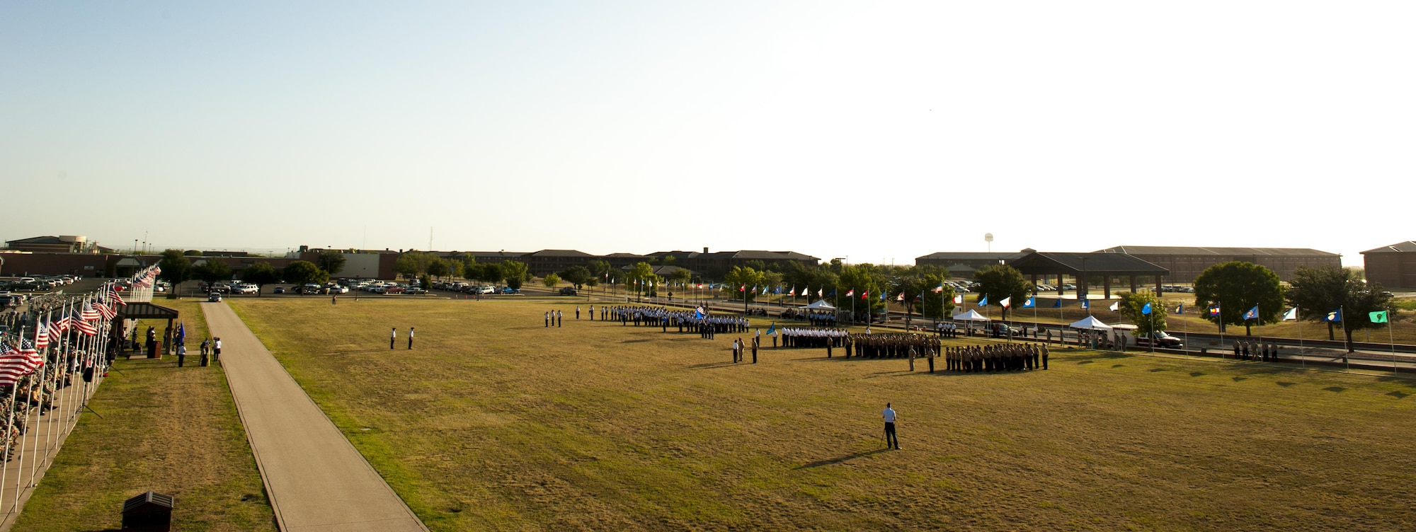 Goodfellow members stand at attention during the 17th Training Wing change of command ceremony on Goodfellow Air Force Base, Texas, July 21, 2017. The change of command ceremony is a time honored military tradition that signifies the orderly transfer of authority. (U.S. Air Force photo by Senior Airman Scott Jackson/Released)