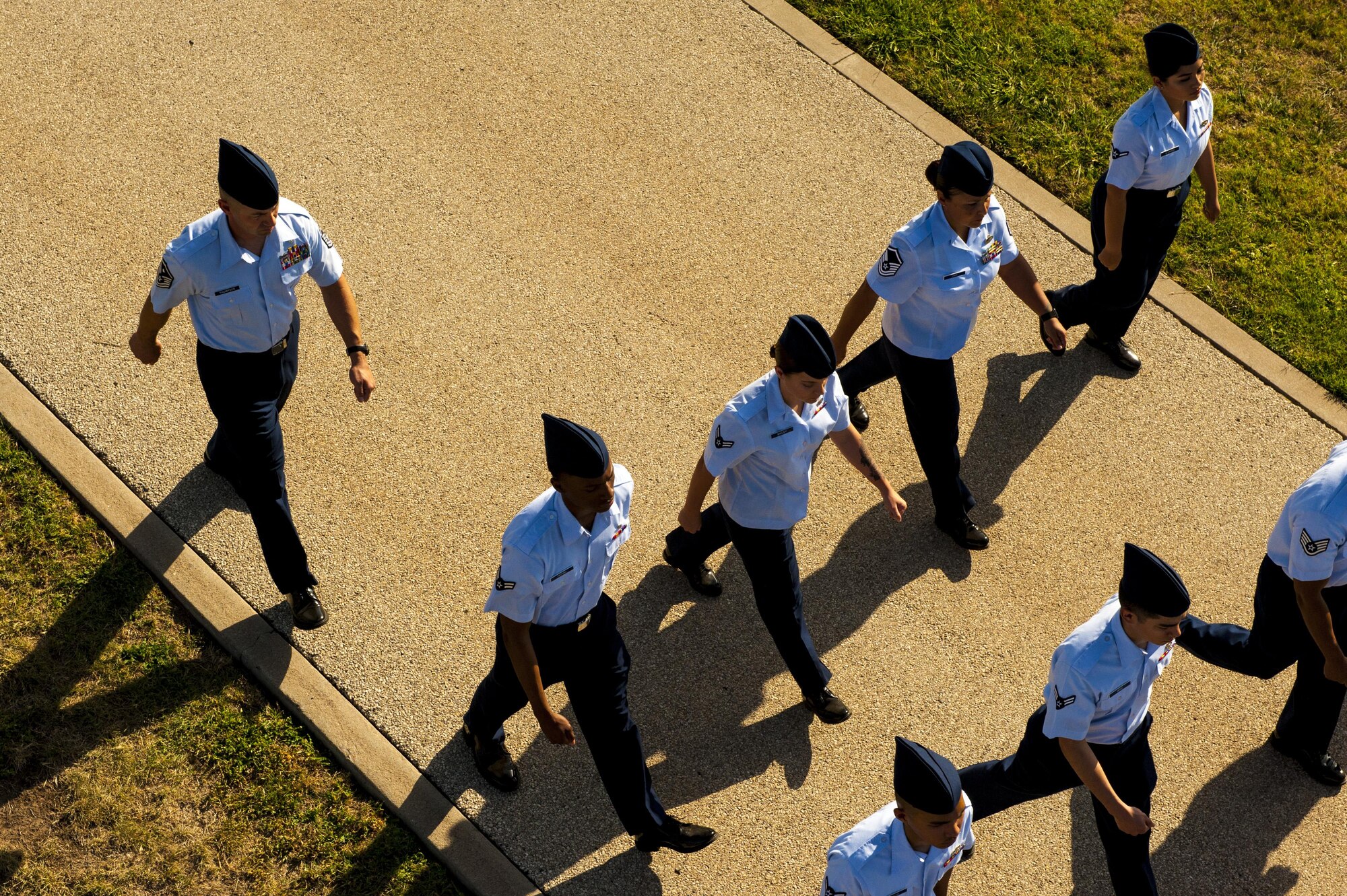 Airmen of the 17th Medical Group march on the bomb run of the parade field during the 17th Training Wing change of command on Goodfellow Air Force Base, Texas, July 21, 2017. The ceremony signifies relinquishment of command from U.S. Air Force Col. Michael Downs to Col. Ricky Mills. (U.S. Air Force photo by Senior Airman Scott Jackson/Released)