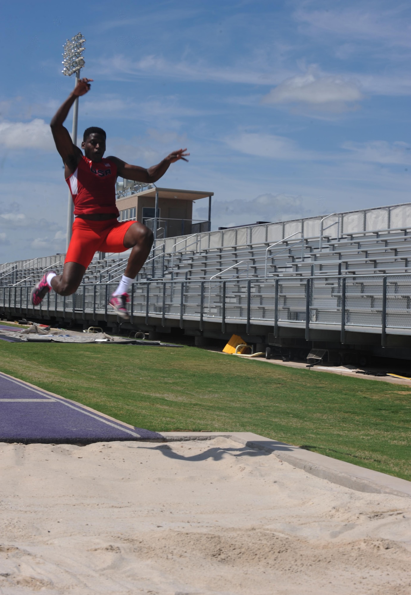 U.S. Air Force Senior Airman Parnelle Shands, 317th Aircraft Maintenance Squadron crew chief, practices long jump at Abilene Christian University, Texas July 13, 2017. Shands recently won first place in the long jump event with a distance of 22’3” at the AirCom Athletics Championships for track and field where he competed against nations such as Belgium, the Netherlands, the United Kingdom and more. (U.S. Air Force photo by Airman Kylee Thomas)