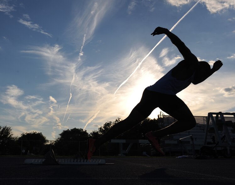 U.S. Air Force Senior Airman Parnelle Shands, 317th Aircraft Maintenance Squadron crew chief, sprints on the track at Abilene Christian University, Texas, July 14, 2017. Shands practices every day to keep improving his speed and technique, as well as staying healthy and fit. (U.S. Air Force photo by Airman Kylee Thomas)