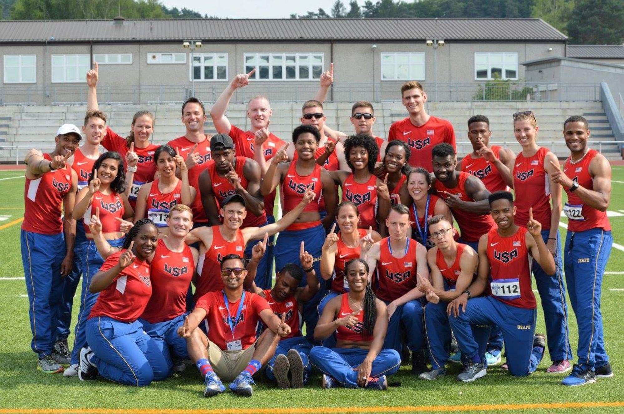 The 2017 U.S. Air Force Track and Field team pose for a group photo at the AirCom Athletics Championships for track and field at Kaiserslautern, Germany, June 21, 2017. Both the men and women teams won gold this year. (Courtesy photo)