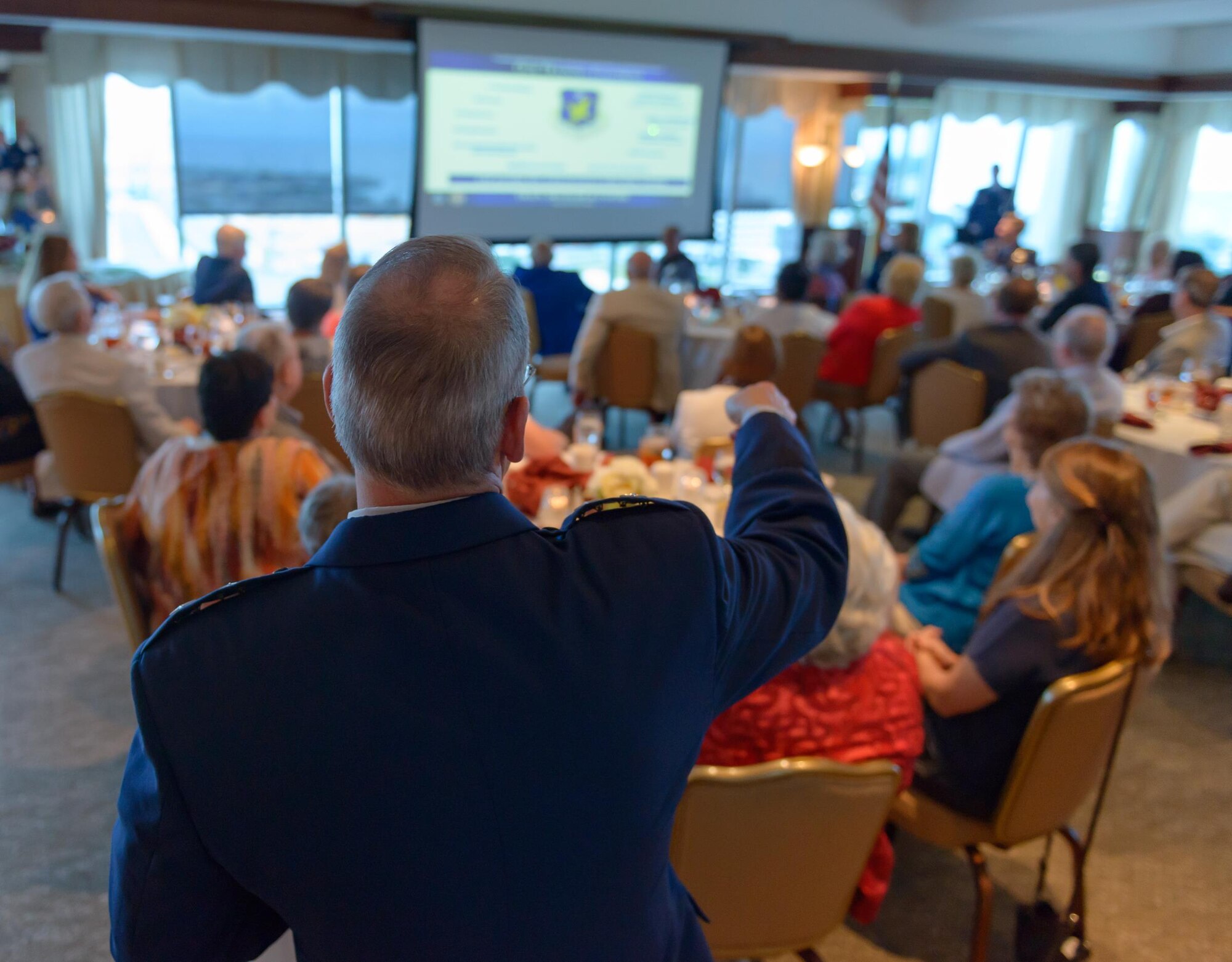 Maj. Gen. Bob LaBrutta, 2nd Air Force commander, briefs the members of the Mississippi Coast Military Officers Association on the mission, role and capabilities of the 2nd AF during the MCMOA dinner at the Great Southern Club July 12, 2017, in Gulfport, Miss. The dinner was held to familiarize the MCMOA members with the current readiness level of the 2nd AF. (U.S. Air Force photo by Andre’ Askew)