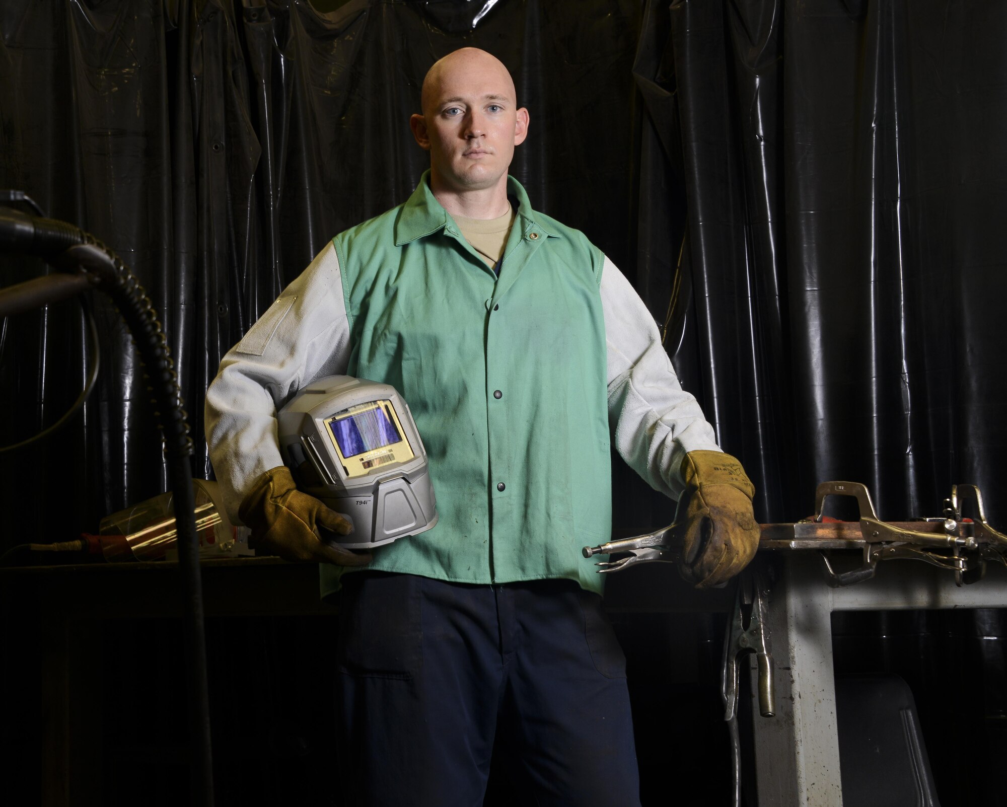 Staff Sgt. Jeffrey Kelnberger, 944th Maintenance Squadron aircraft metals technician, poses for a portrait at Luke Air Force Base, Ariz., July 19, 2017. The metals technology shop at Luke is comprised of approximately 22 Airmen who provide maintenance support to several squadrons on base to continue building the future of airpower. (U.S. Air Force photo/Airman 1st Class Caleb Worpel)