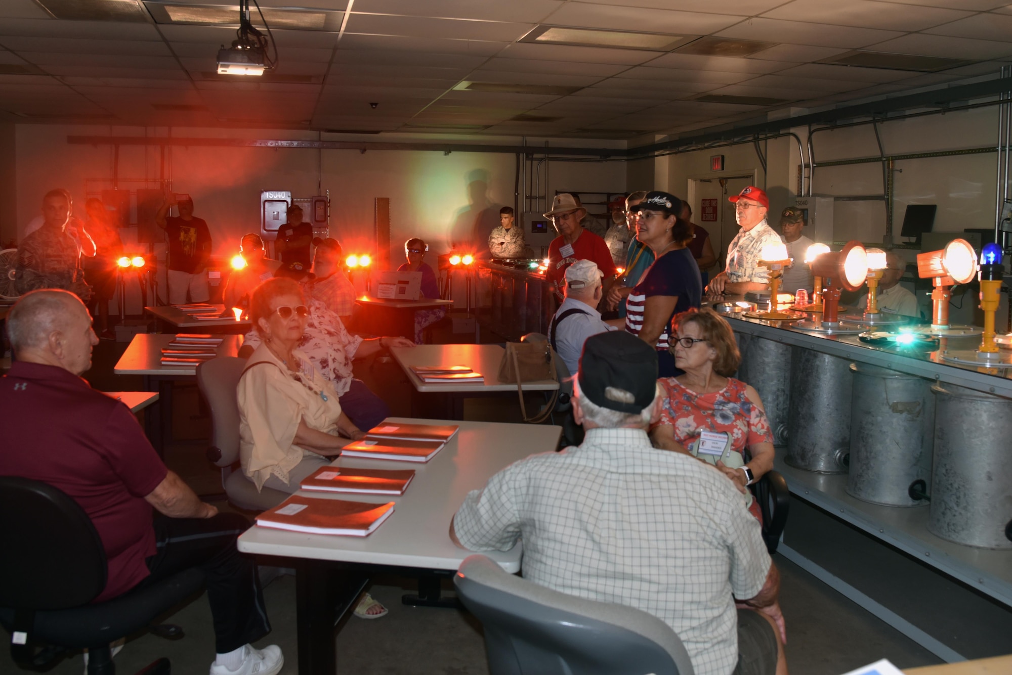 The 555th Red Horse Squadron Vietnam Vets Reunion group visited Sheppard Air Force Base, July 21, 2017, to receive a tour of the 366th Training Squadron’s civil engineering technical training facility. The guests received a demonstration of equipment used to light runways. (U.S. Air Force photo by 2nd Lt. Jacqueline Jastrzebski)